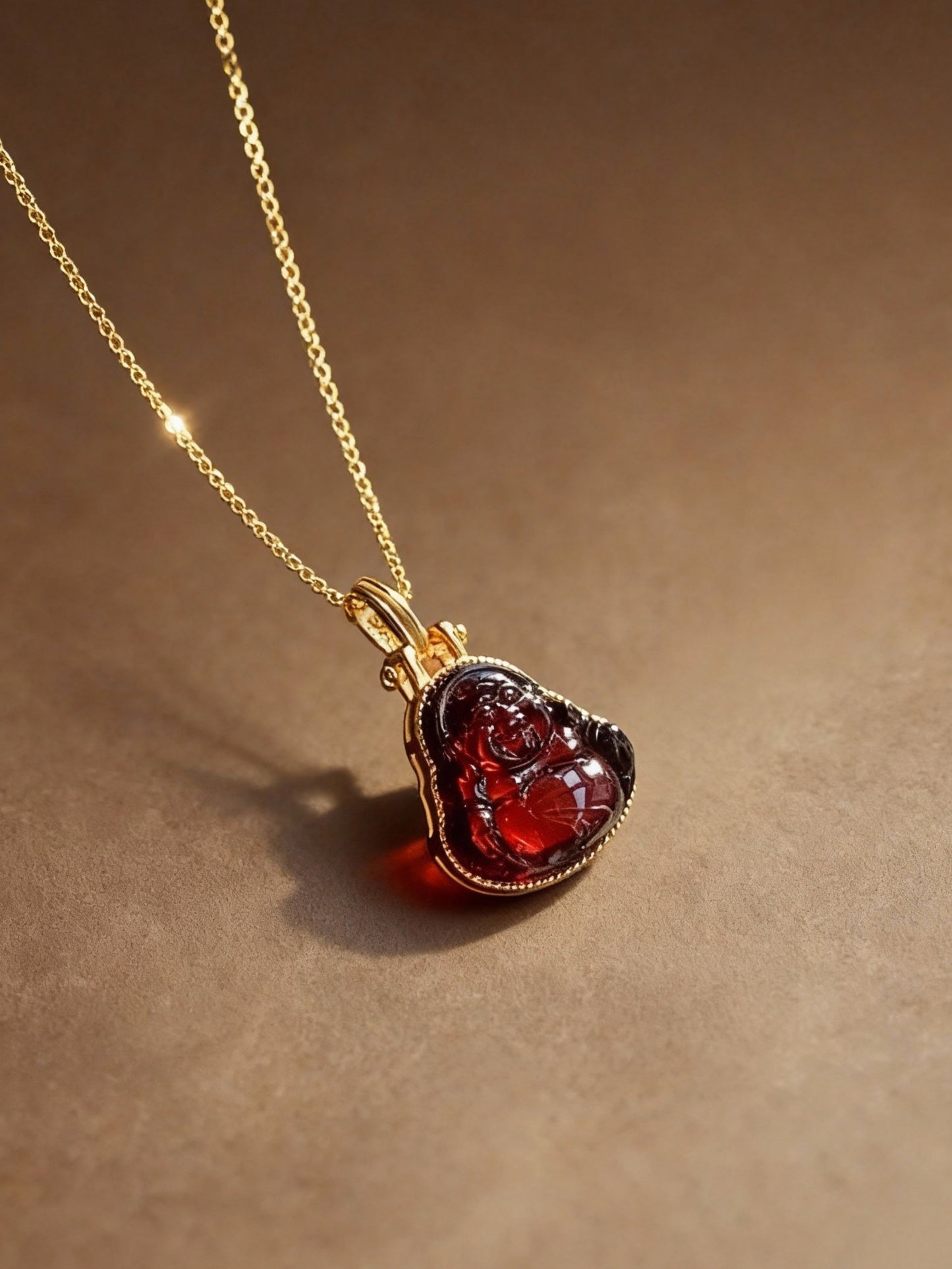 Blood amber necklace with traditional Maitreya Buddha pendant