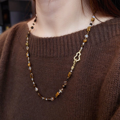 Long tiger eye necklace with decorative zircon gourd charm