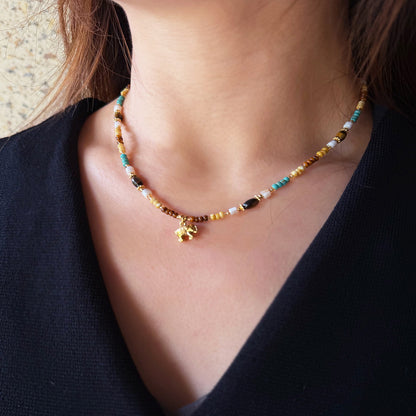 Natural mixed stone necklace showing elephant charm detail