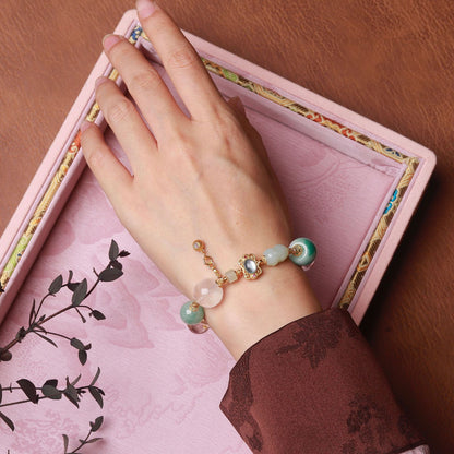 Close-up view of ghost jade crystal beads