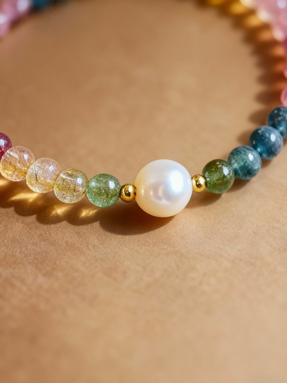 Detail of multi-colored tourmaline and pearl beaded bracelet