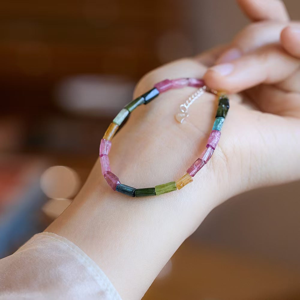 Close-up of colorful tourmaline tube beads on bracelet