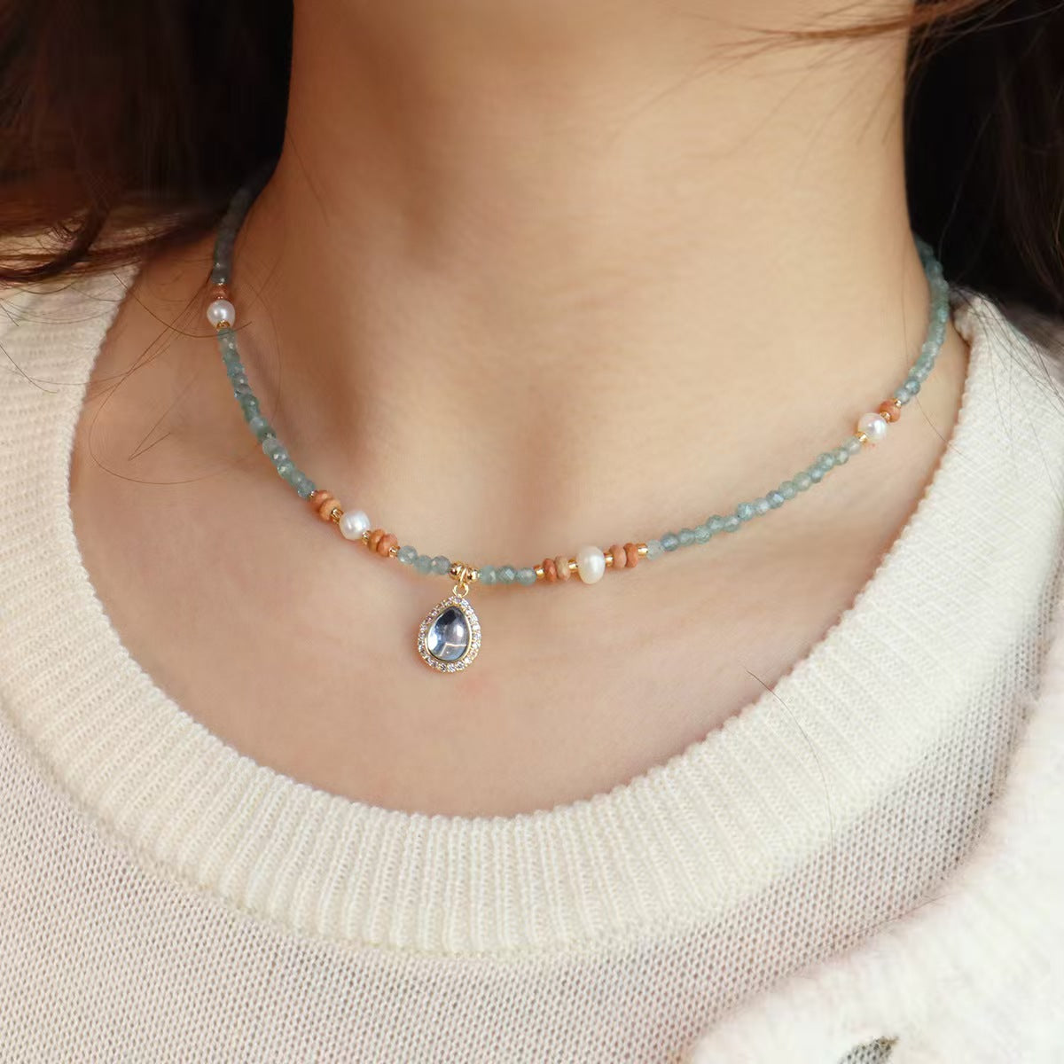 Aquamarine heart necklace with freshwater pearl and blue crystals