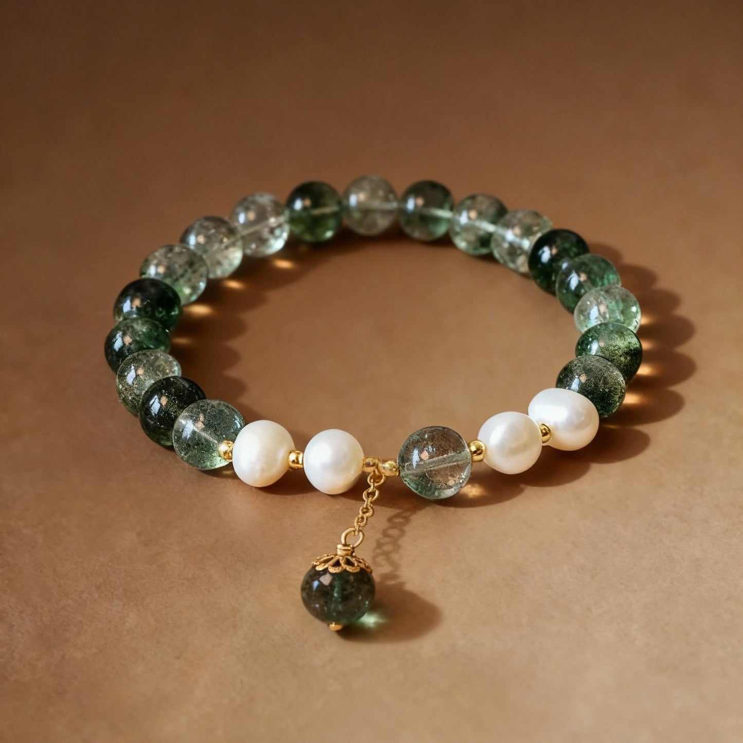 Natural phantom quartz and freshwater pearl bracelet with gold accents