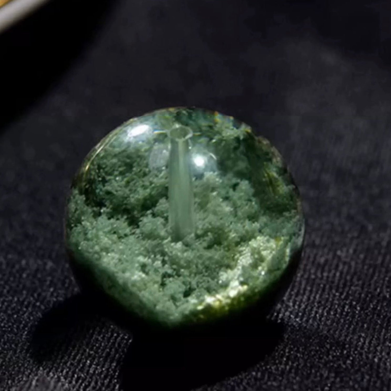 Grade green phantom quartz bracelet with visible mineral inclusions