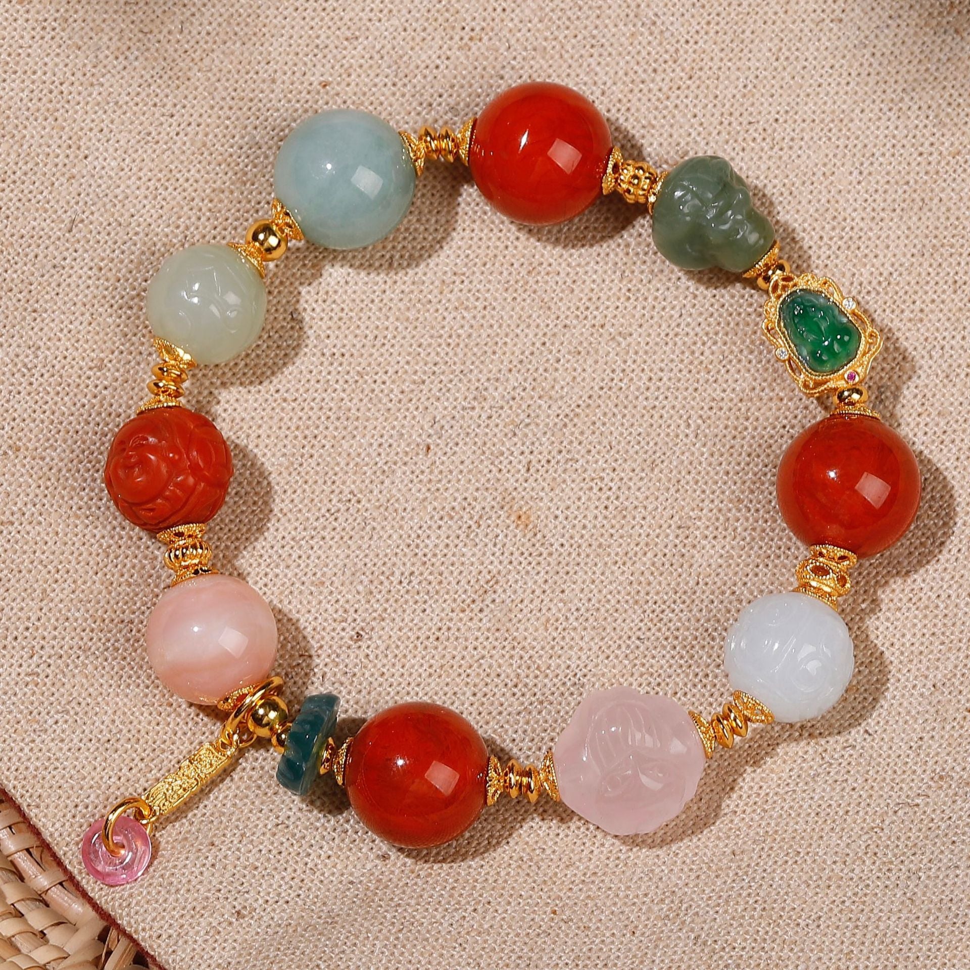 Multi-gemstone lucky bracelet featuring natural jadeite, Nan Hong agate, Hetian jade and rose quartz beads with 24K gold-plated S925 silver accents