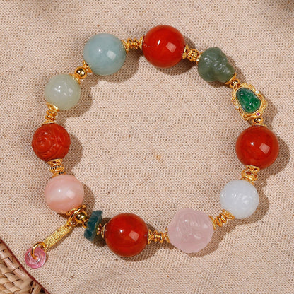 Multi-gemstone lucky bracelet featuring natural jadeite, Nan Hong agate, Hetian jade and rose quartz beads with 24K gold-plated S925 silver accents