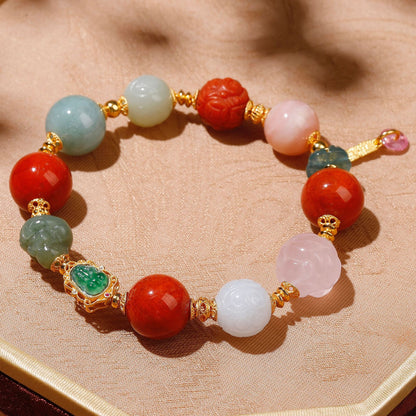 Natural rose quartz phoenix carving and white Hetian jade bead detail on lucky gemstone bracelet