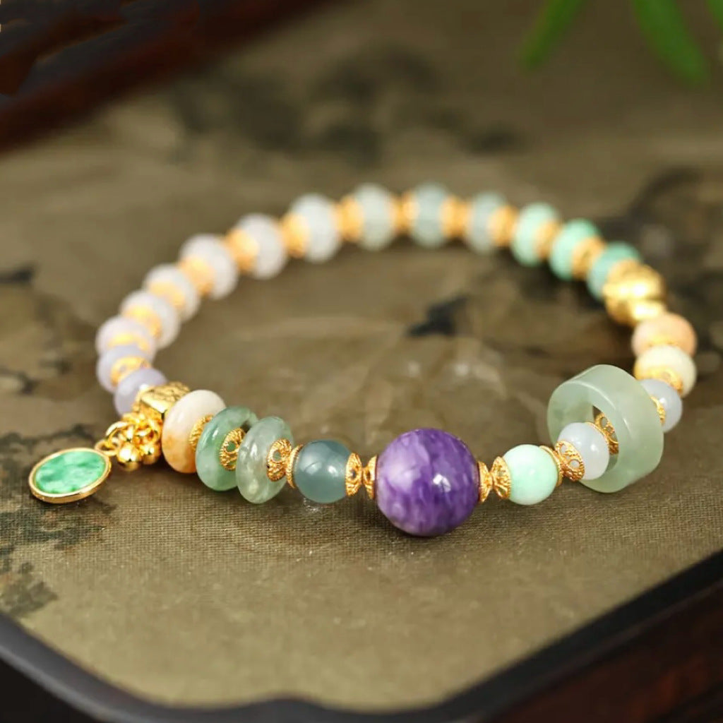 Tri-color jadeite abacus bead bracelet with purple charoite centerpiece, vivid green jade peace pendant and 18K gold-plated S925 silver peace gourd charm