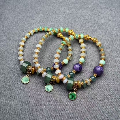 Tri-color jadeite abacus bead bracelet with purple charoite centerpiece, vivid green jade peace pendant and 18K gold-plated S925 silver peace gourd charm