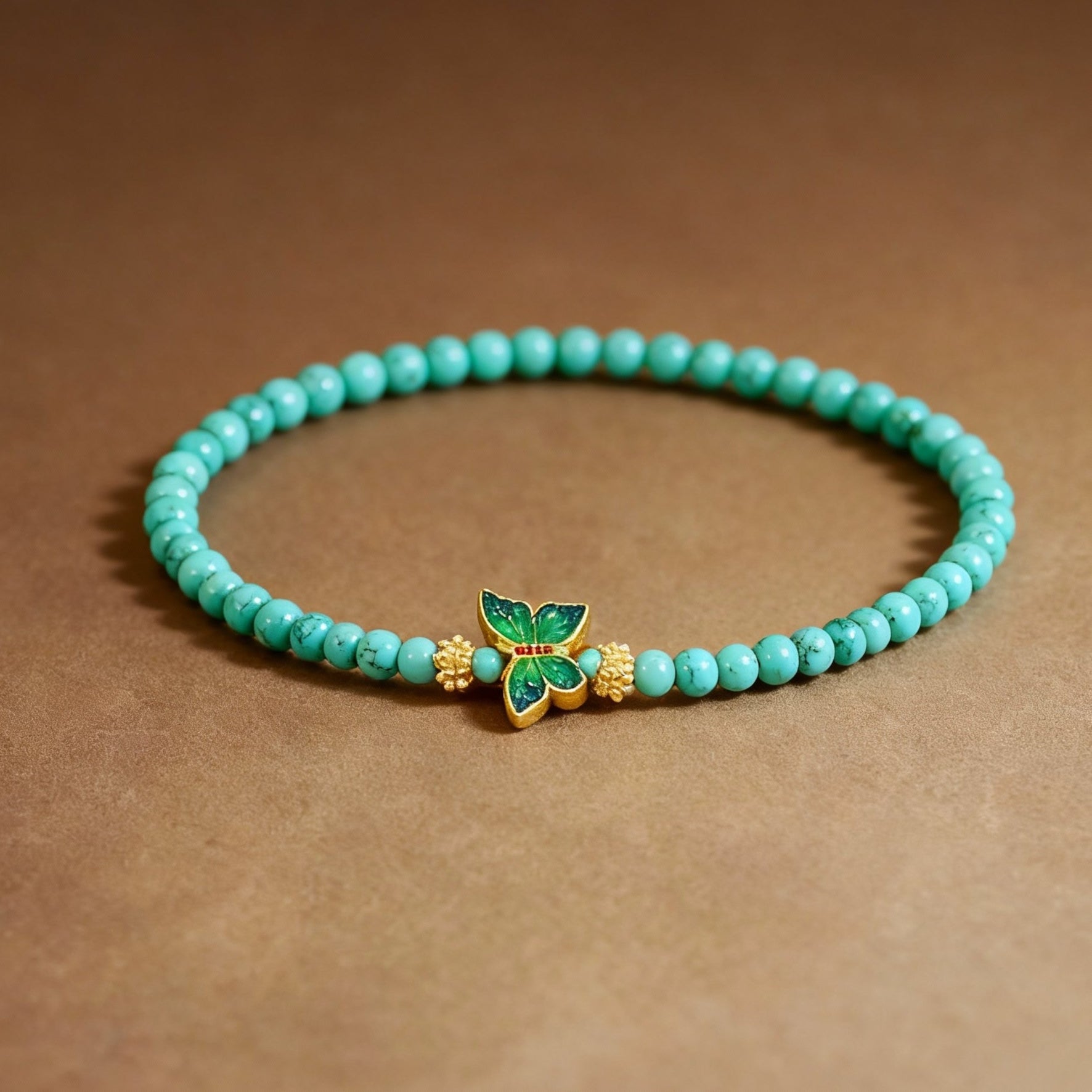 Natural turquoise and enamel butterfly bracelet with blue stones