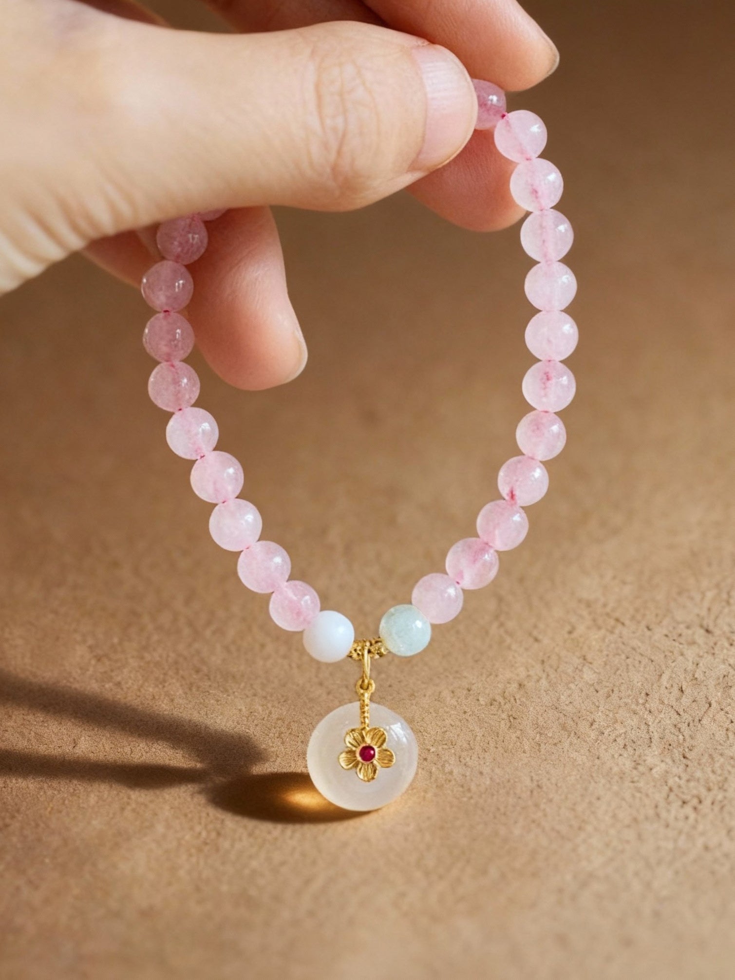 Natural pink crystal bracelet with white jade beads