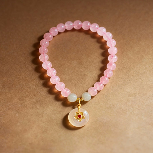 Pink crystal and white jade bracelet with natural stones