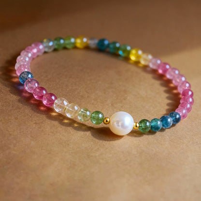 Close-up of colorful tourmaline beads with white pearl accents