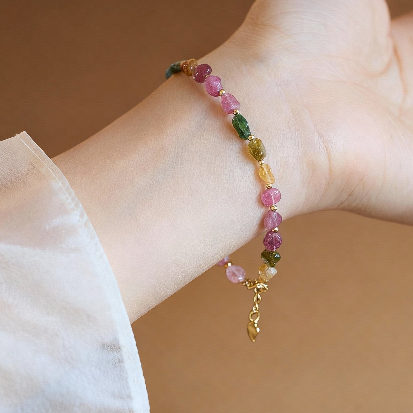 Close-up of raw tourmaline beads showing rainbow candy colors