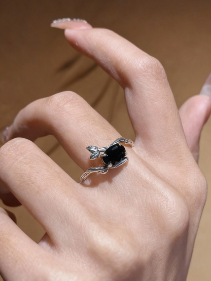 Black spinel gemstone ring with organic twig band