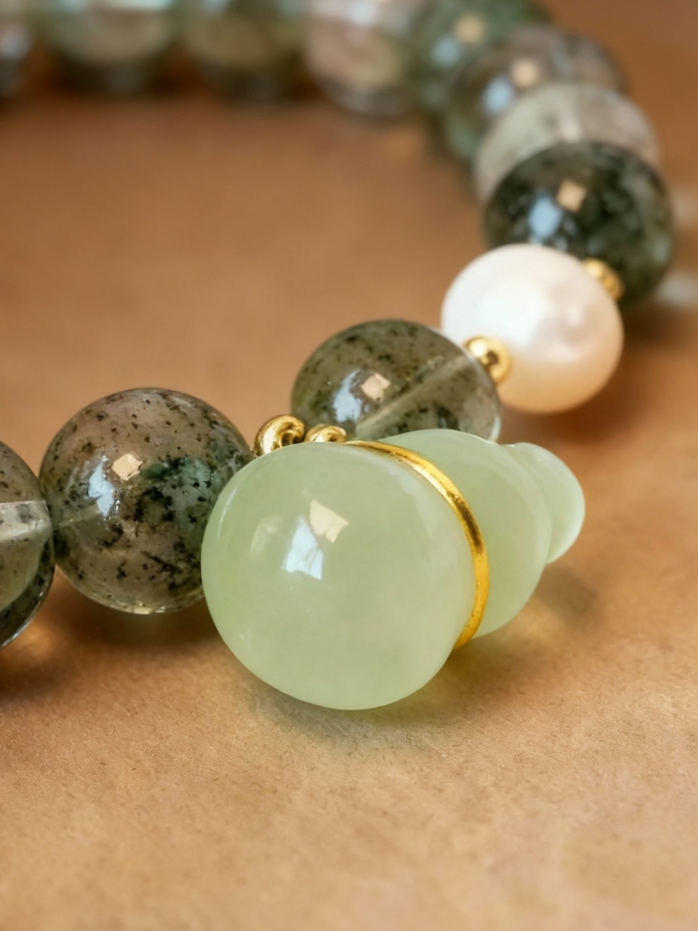 Natural phantom quartz and serpentine beaded wealth charm bracelet