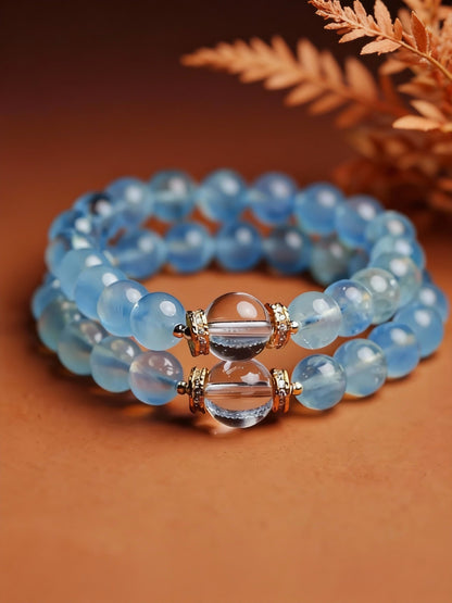 Detail shots of aquamarine and quartz beadwork