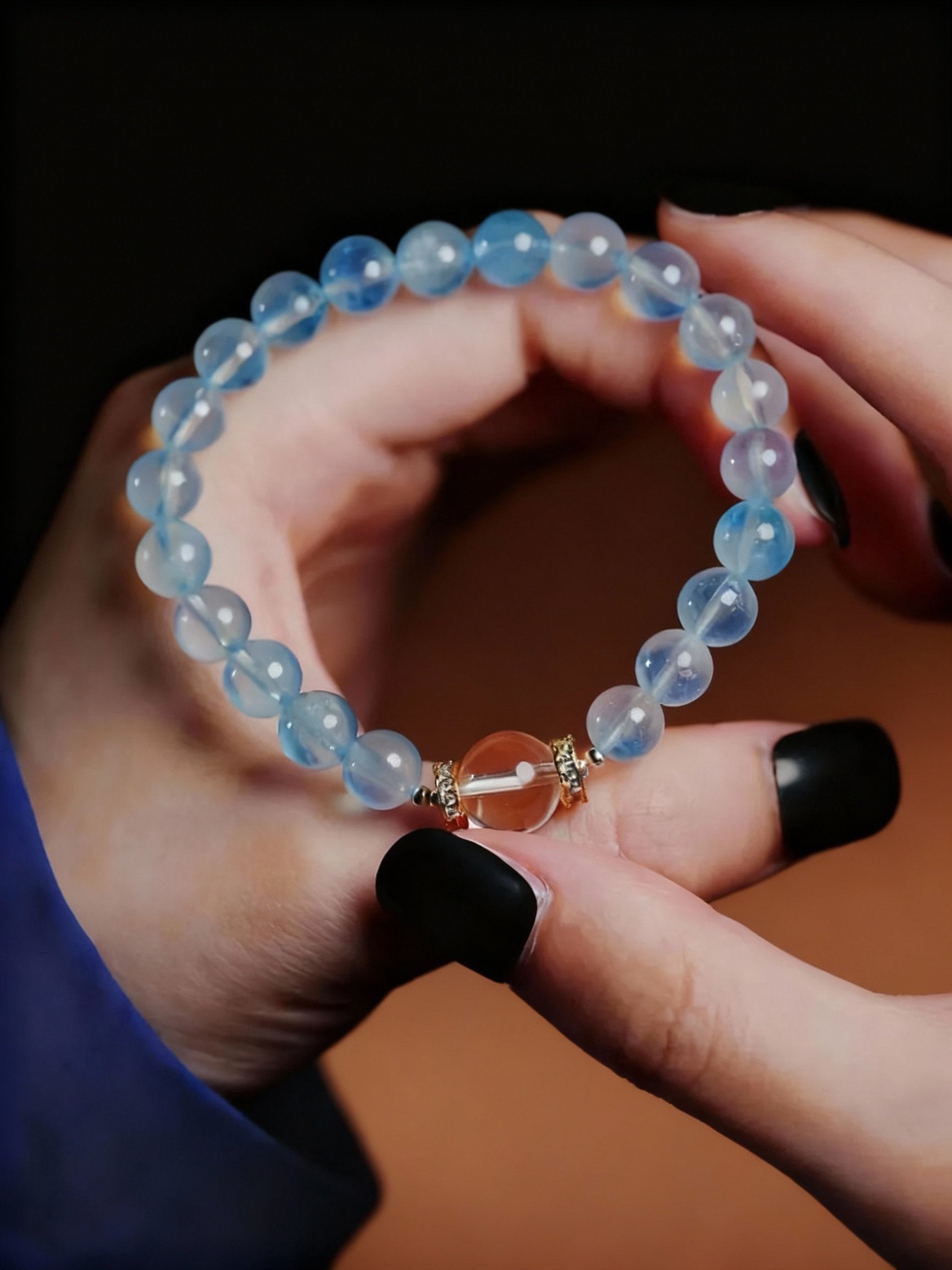 Detail shots of aquamarine and quartz beadwork