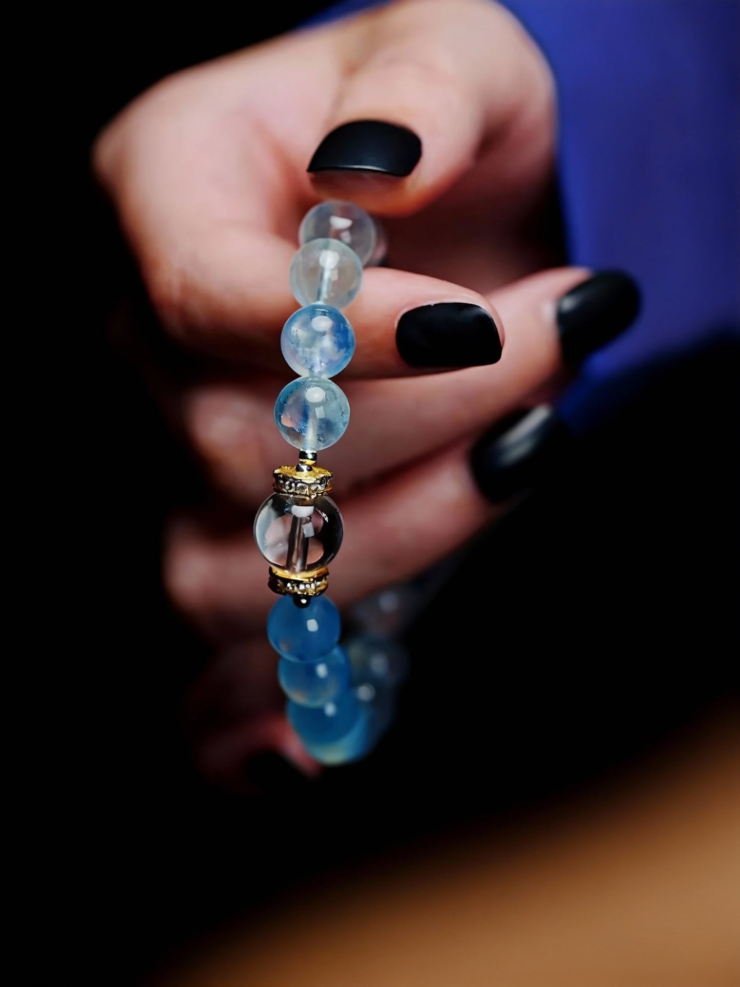 Detail shots of aquamarine and quartz beadwork