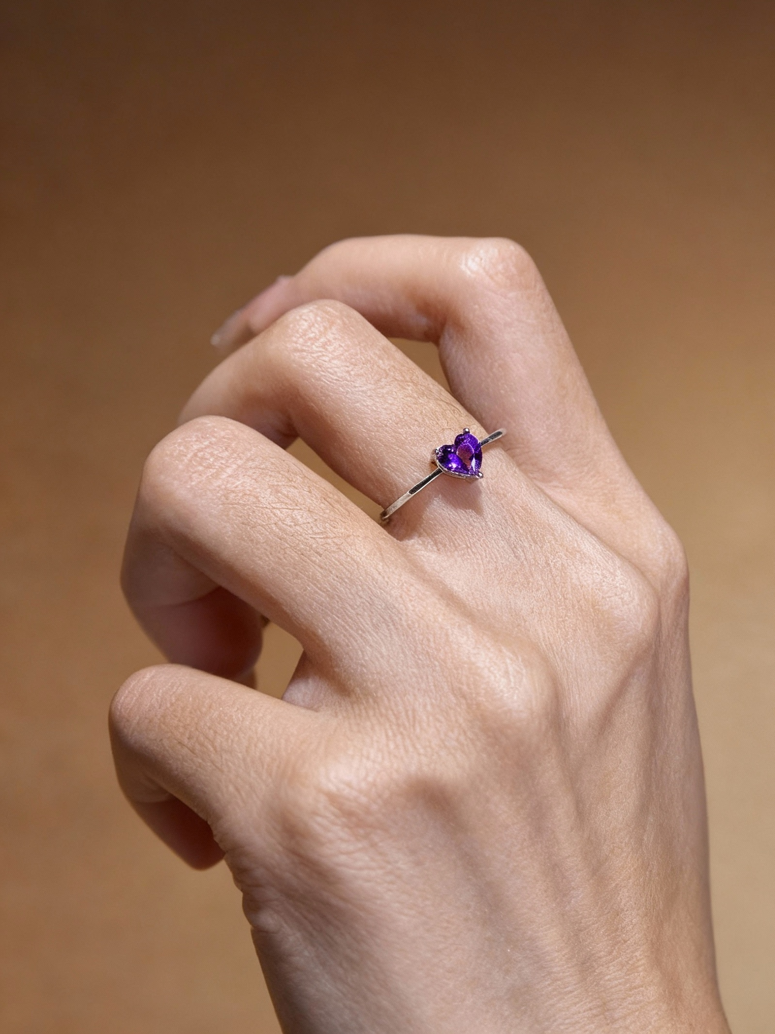 Heart-shaped amethyst ring showing deep purple color