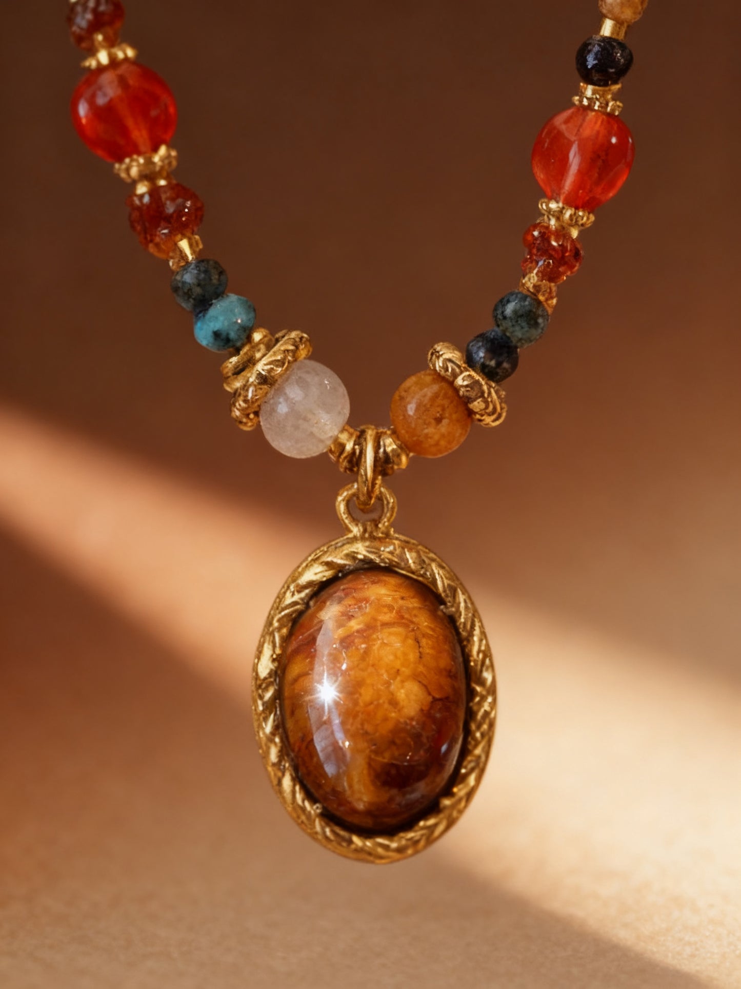 Close-up of colorful mixed gemstone beads on necklace