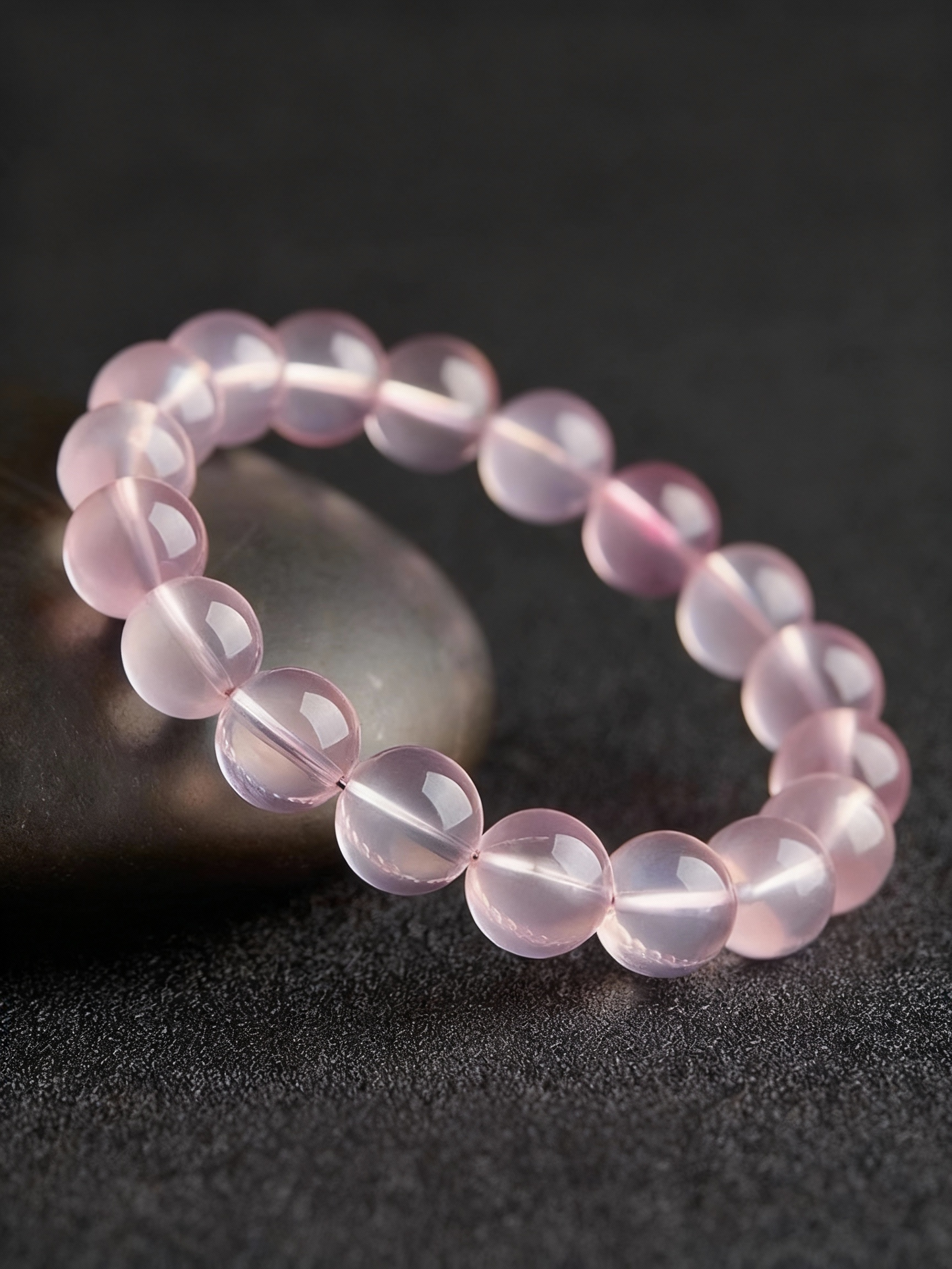 Premium rose quartz crystal bracelet showing pink gemstone quality
