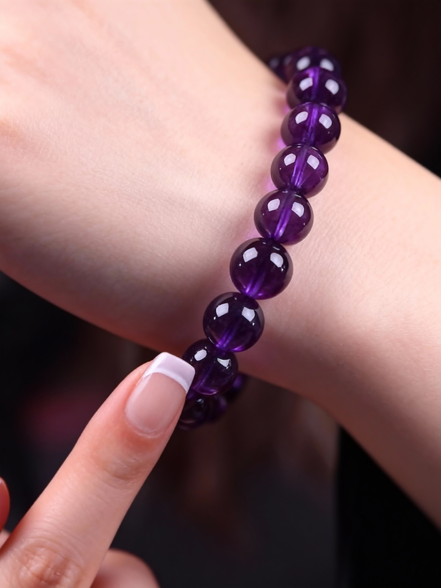 Natural amethyst bracelet showing deep purple gemstone quality