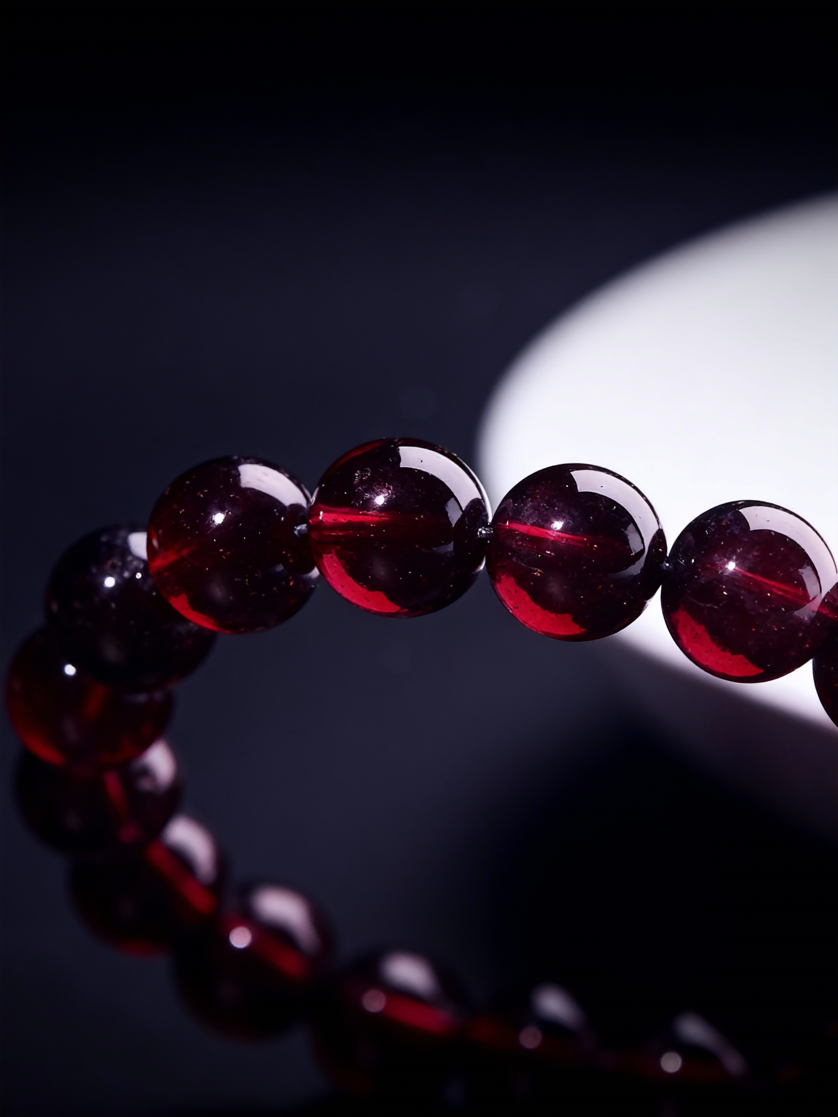 Natural rhodolite garnet bracelet showing crystal transparency