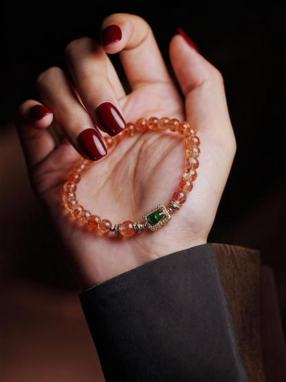 Close-up of sunstone beads with aventurescence effect