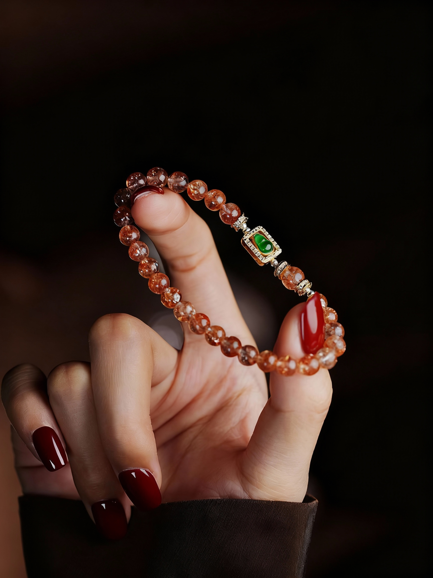 Orange sunstone and jade bracelet showing natural stone quality
