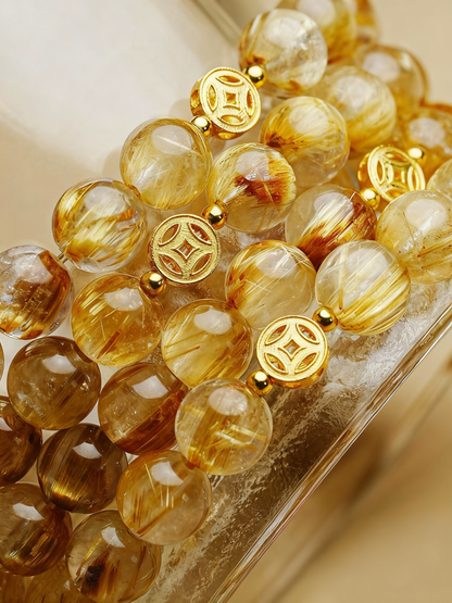Rutilated quartz crystal beads with traditional lucky coin pendant