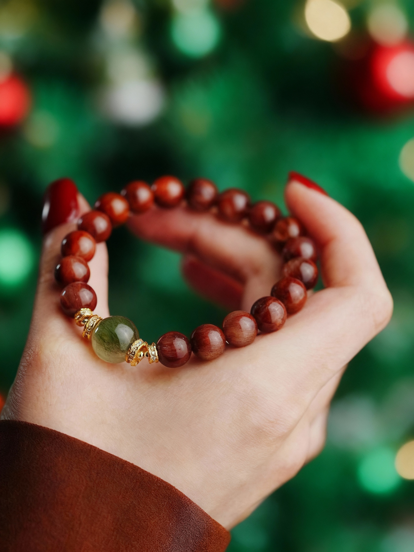 Red and green crystal bracelet showing natural stone variations