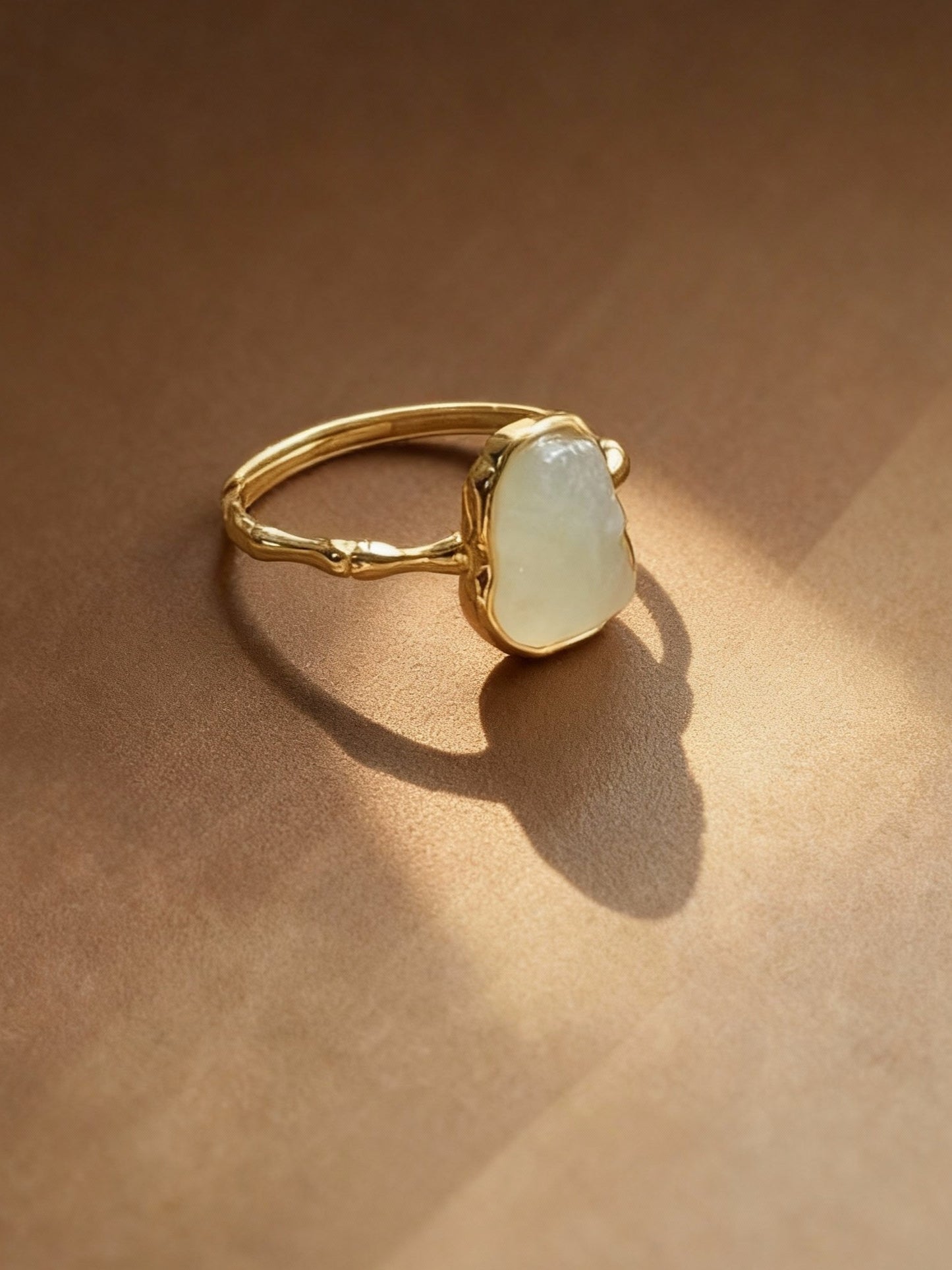 Hetian jade ring showing translucent white stone quality