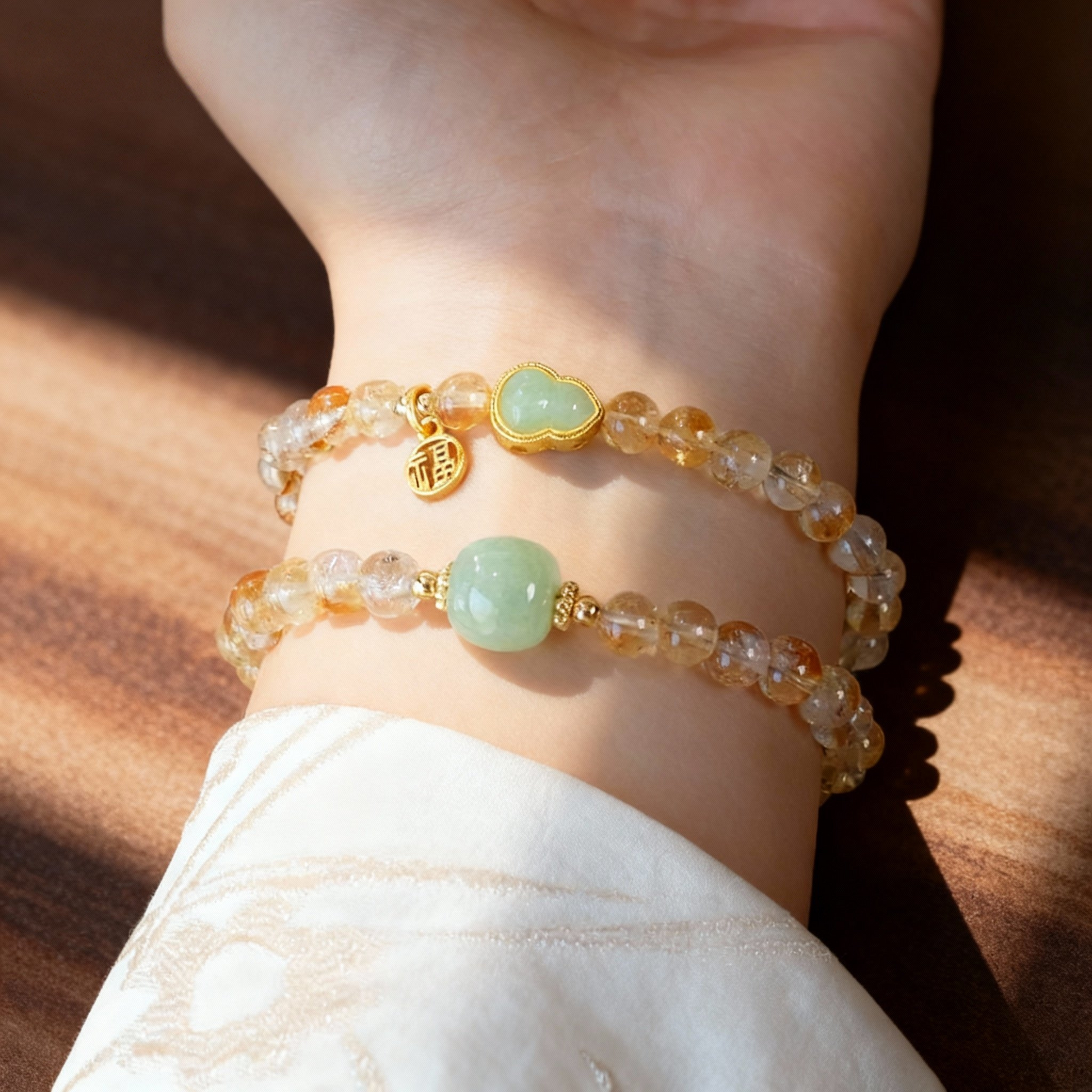 Golden citrine bracelet with nephrite jade Buddha charm