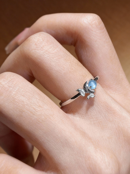 Aquamarine and aventurine ring with decorative angel wing design