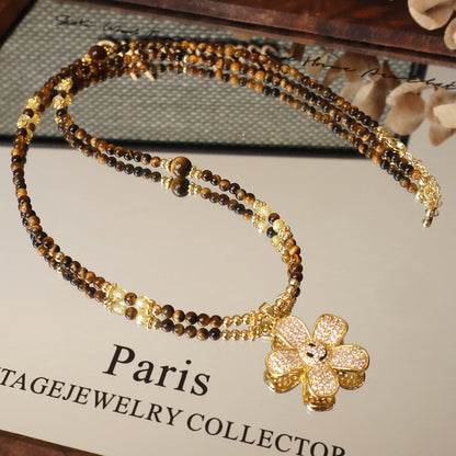 Tiger eye long sweater chain with zircon flower charm detail