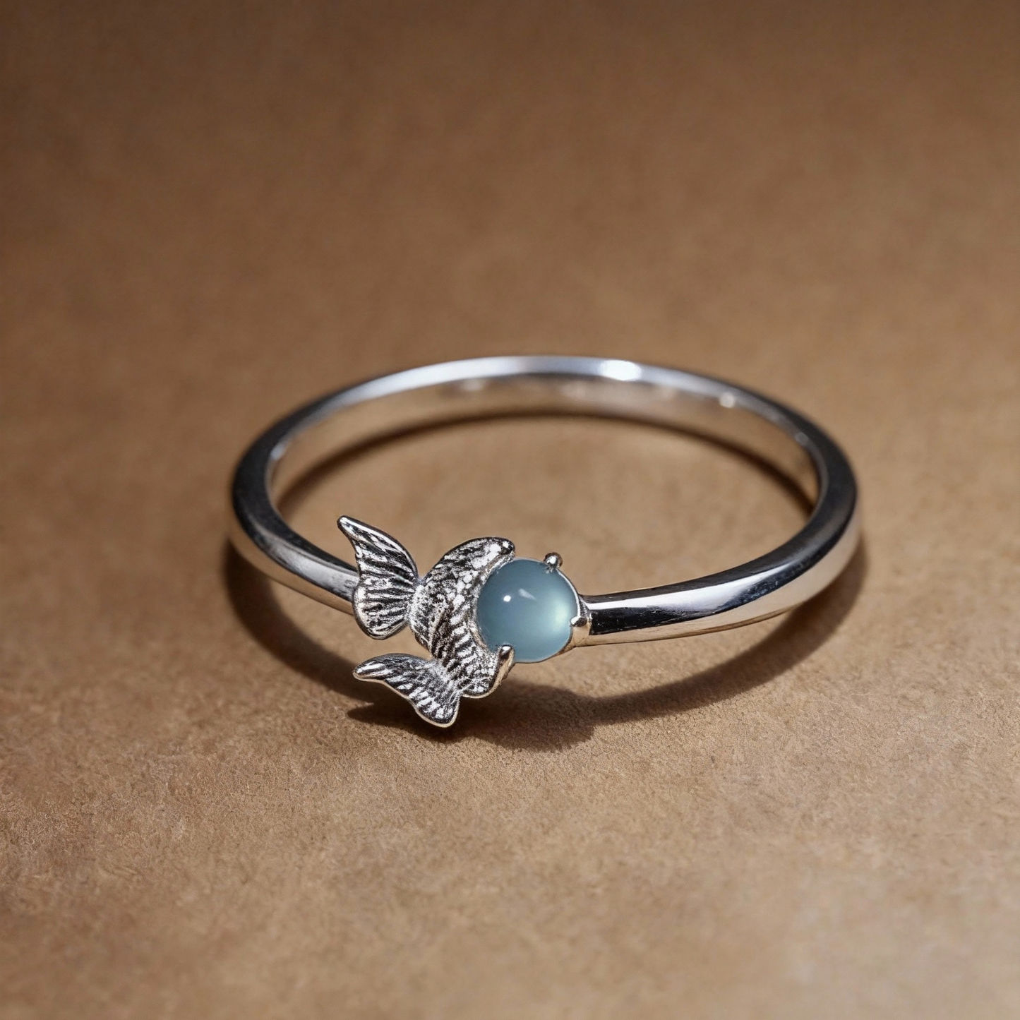 Angel wing ring with aquamarine and aventurine gemstones