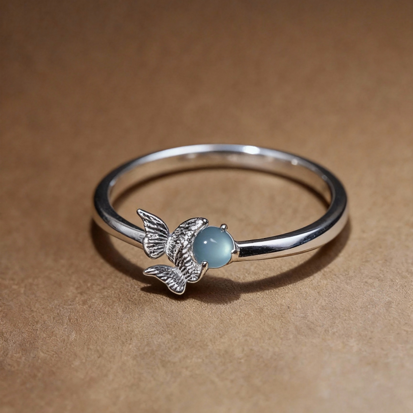 Angel wing ring with aquamarine and aventurine gemstones