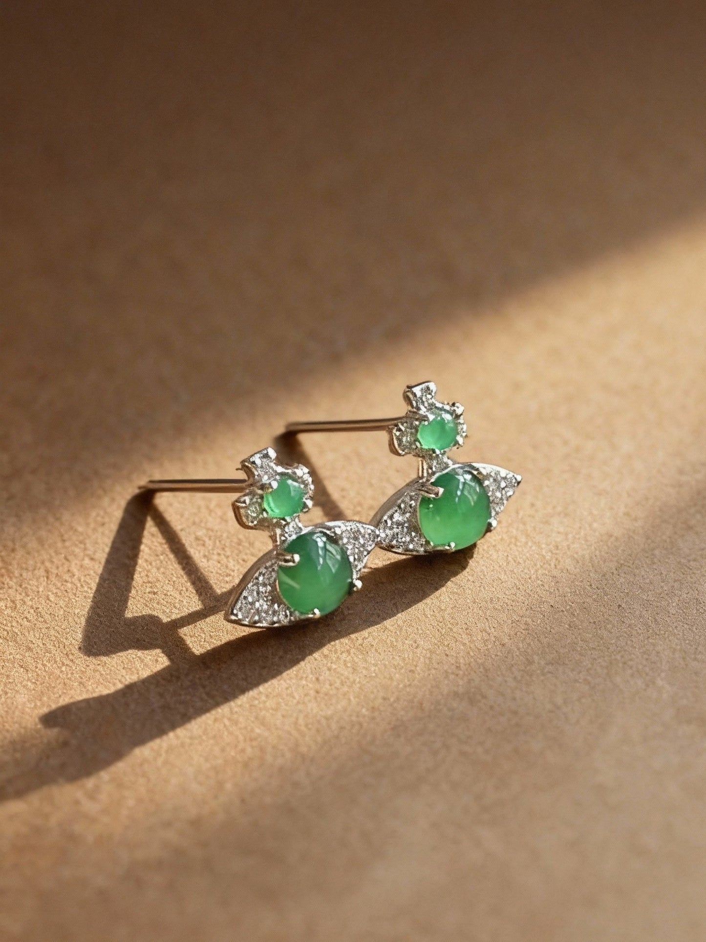 Close-up of nephrite jade and jasper earrings showing rich green color