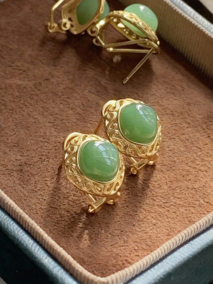 Green nephrite jade earrings showing natural stone quality
