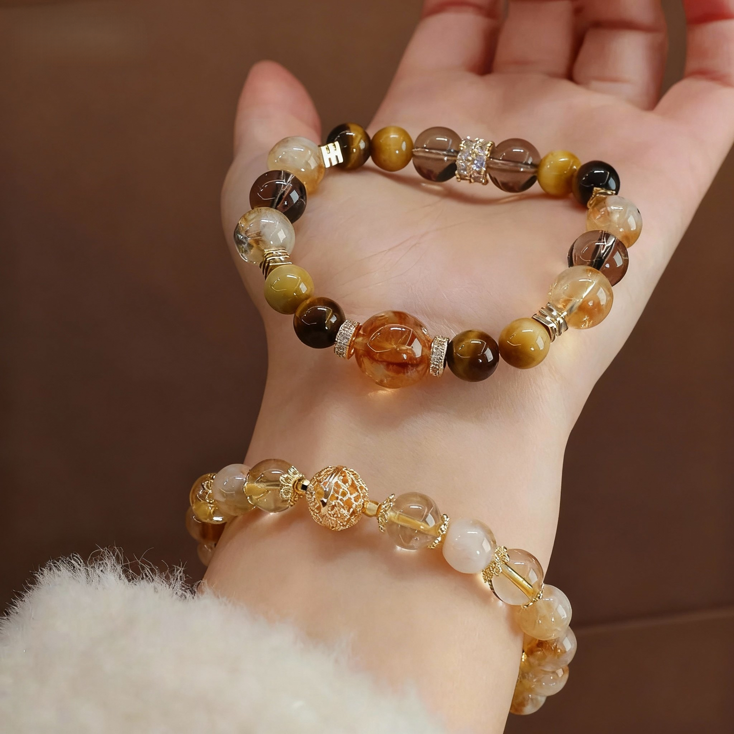 Golden rutilated quartz and tiger's eye bracelet showing golden tones