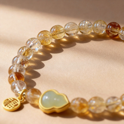 Yellow citrine crystal bracelet with green jade gourd pendant