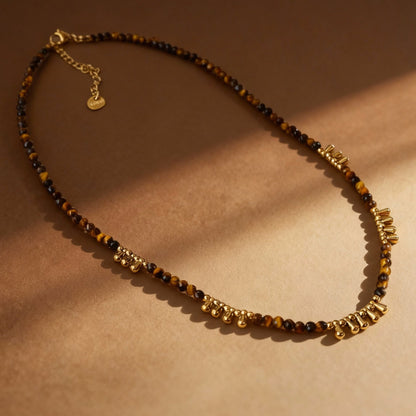 Close-up of tiger eye beads showing golden-brown chatoyant effect