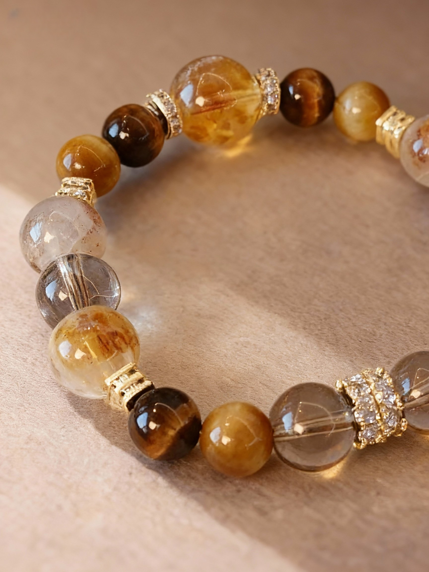 Golden tiger's eye bracelet with natural rutilated quartz stones