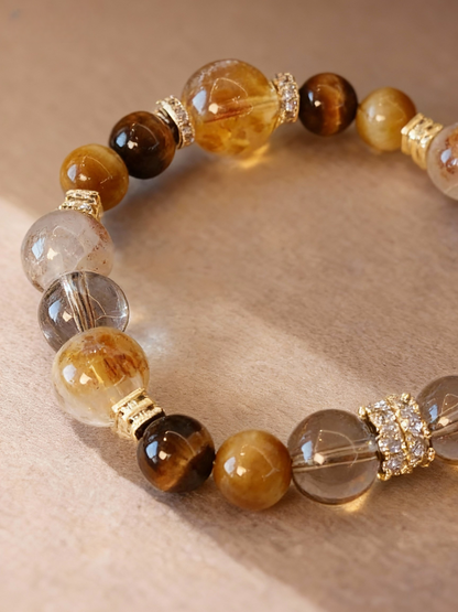 Golden tiger's eye bracelet with natural rutilated quartz stones