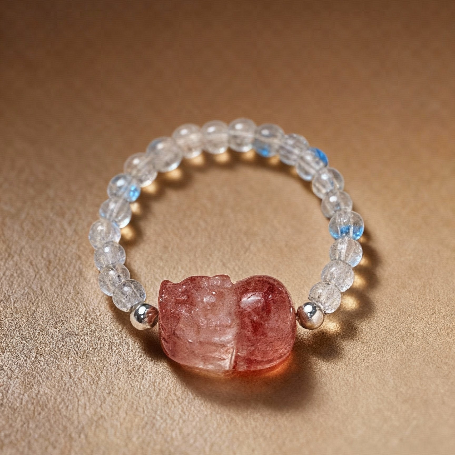 Detail of natural tourmaline and clear quartz ring with Pixiu design