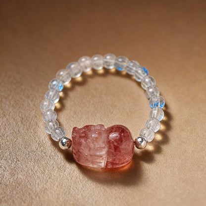 Detail of natural tourmaline and clear quartz ring with Pixiu design