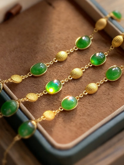 Nephrite jade bracelet with traditional green stone