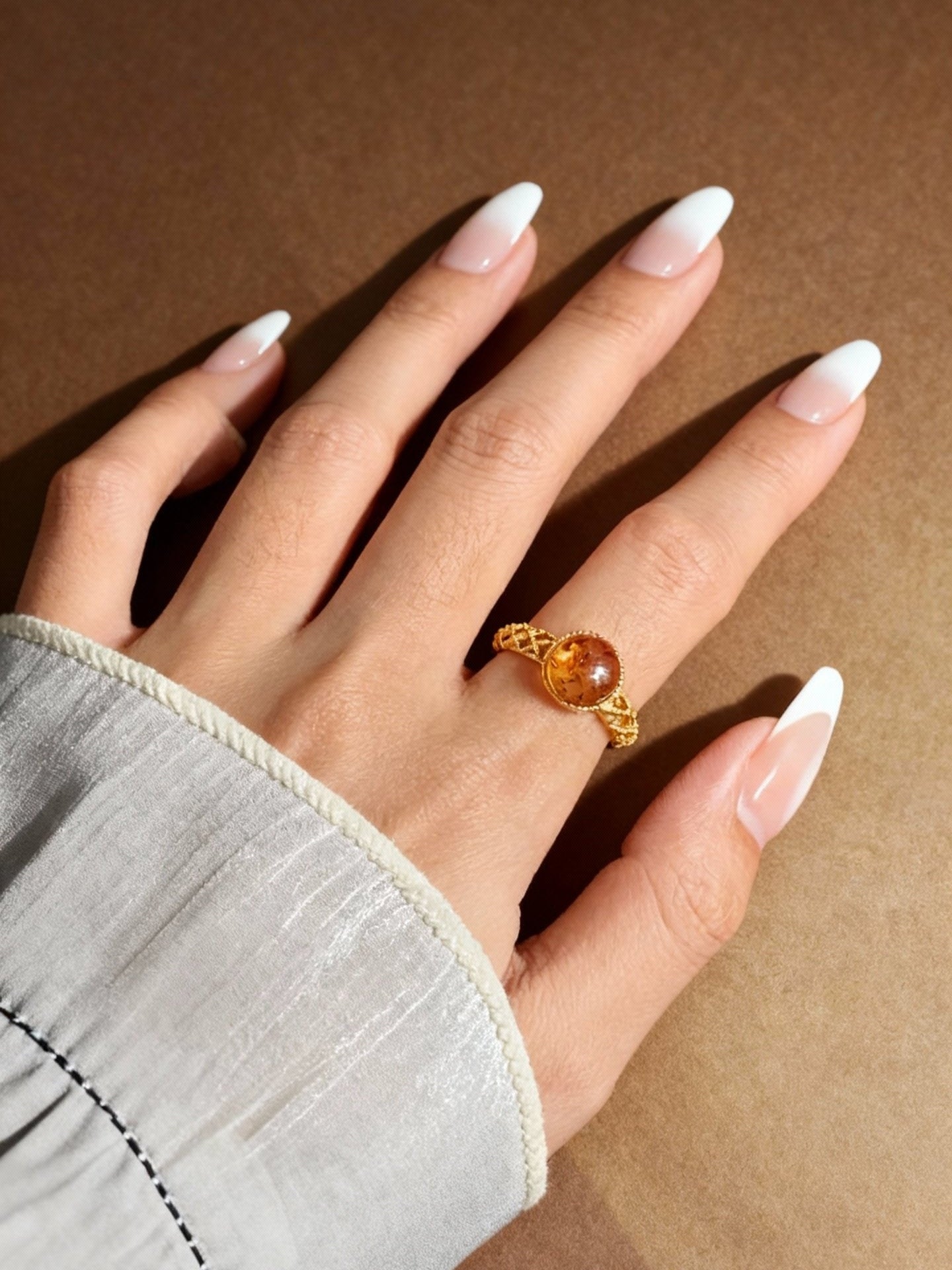 Natural flower amber ring with rich golden honey color
